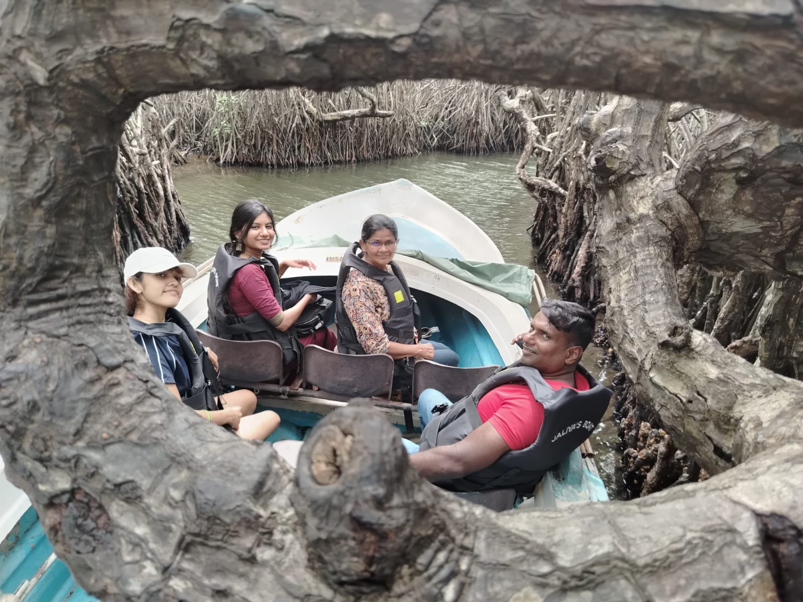 Alice's group enjoying a mangrove boat trip in Sri Lanka